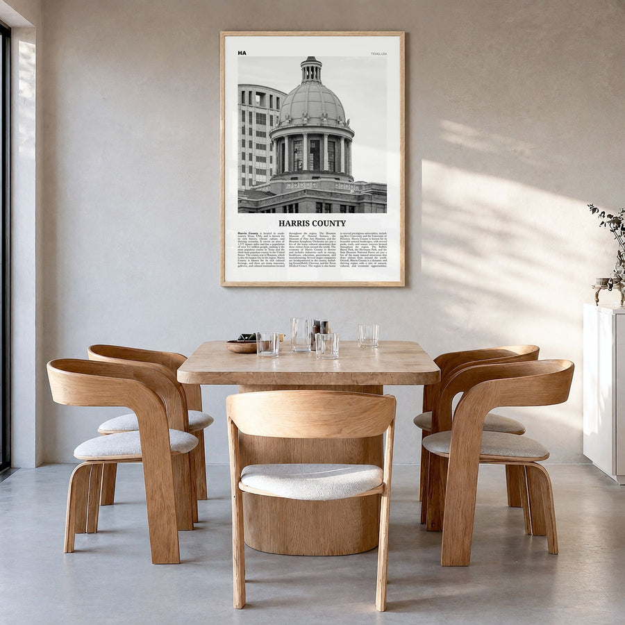Harris County Newspaper Poster in a natural wood frame, hanging in a dining room
