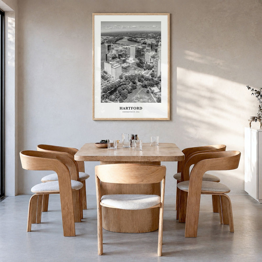 Hartford Classic Poster in a natural wood frame, hanging in a dining room