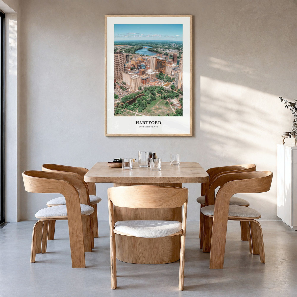 Hartford Classic No 1 Poster in a natural wood frame, hanging in a dining room