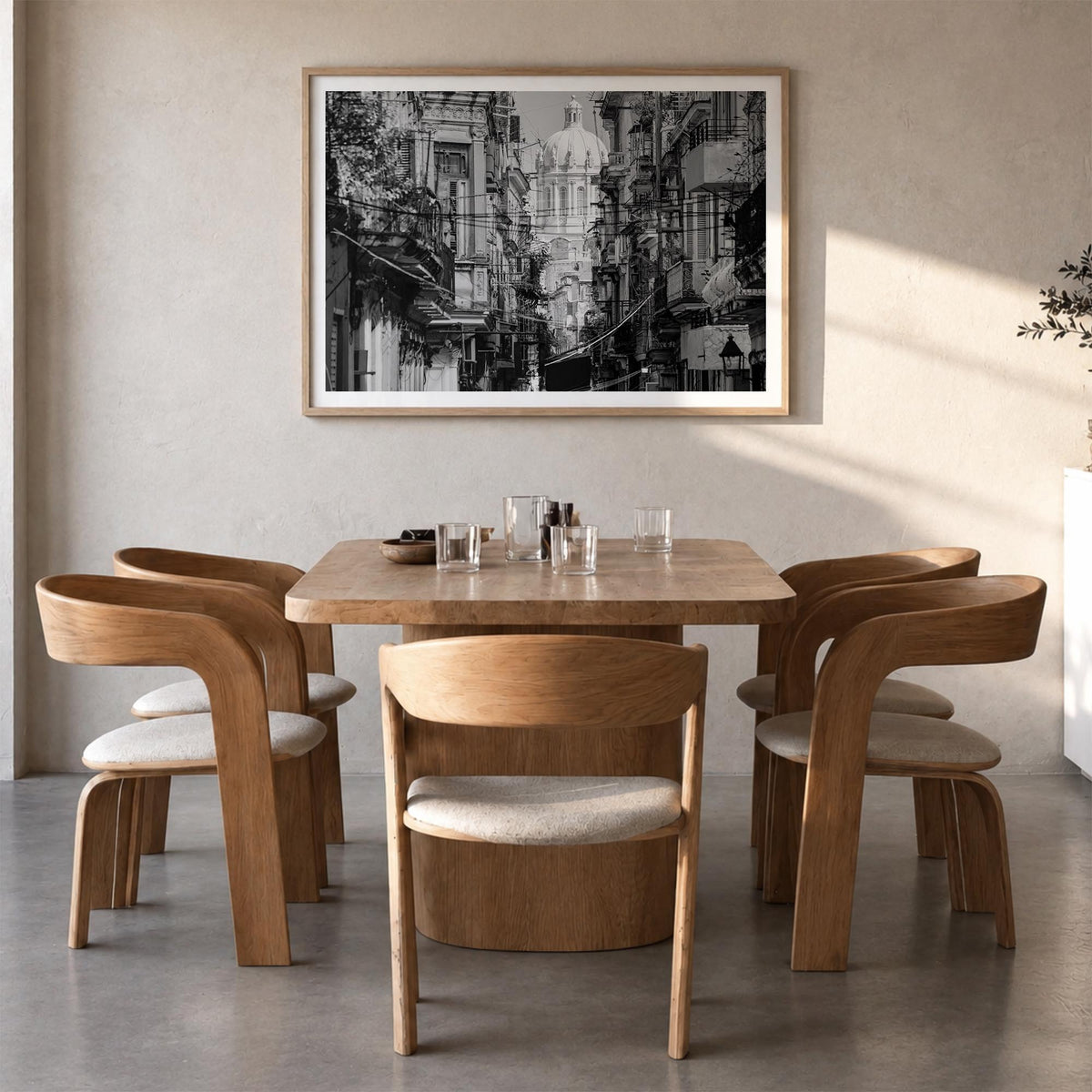 Havana black & white photo poster of Cuba – horizontal wall art in natural wood frame with white border, hanging on wall