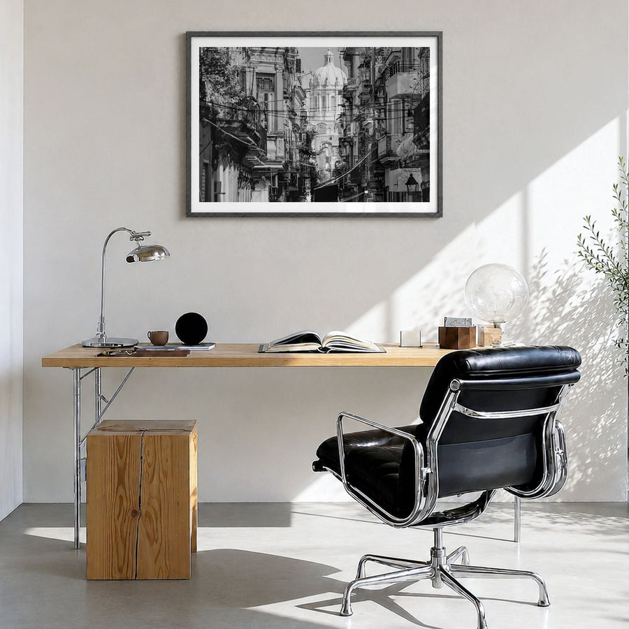 Havana Photo Poster in a black wood frame, hanging in a bright home office, white border