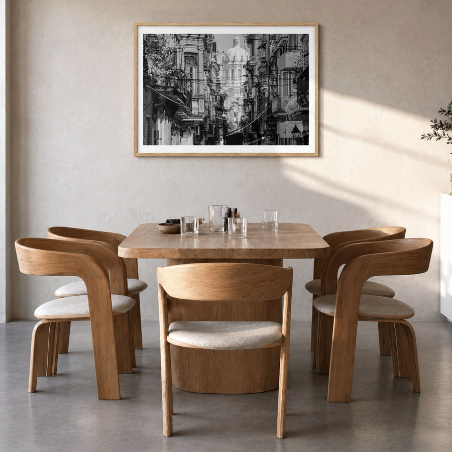Havana Photo Poster in a natural wood frame, hanging in a dining room, white border