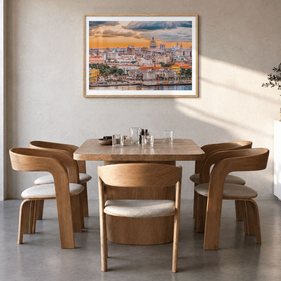 Havana Photo Poster in a natural wood frame, hanging in a dining room, white border