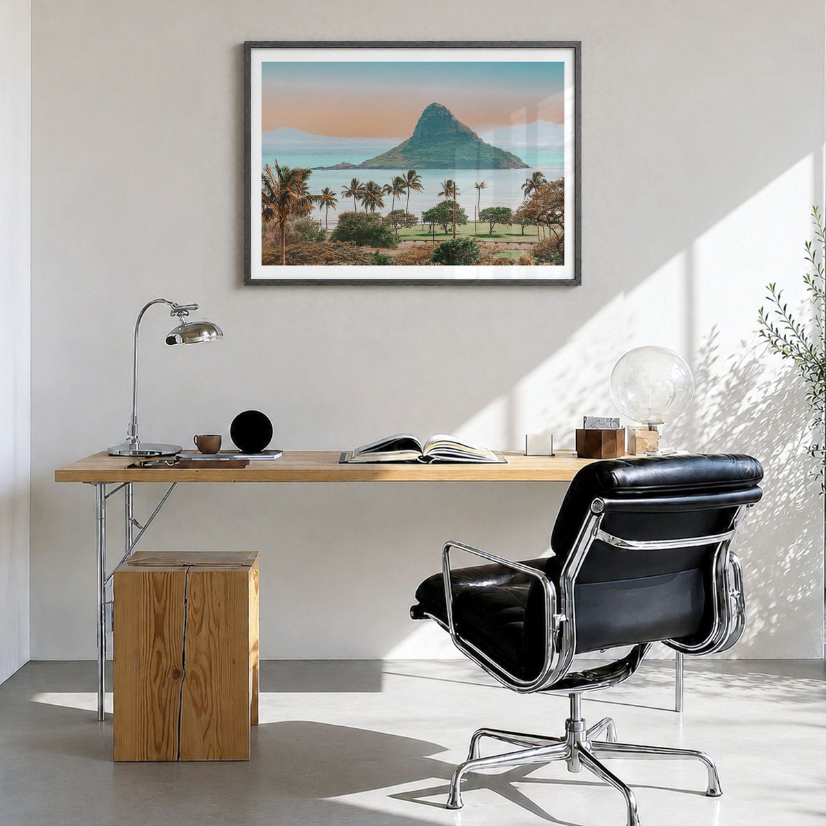 Hawaii Photo Poster in a black wood frame, hanging in a bright home office, white border