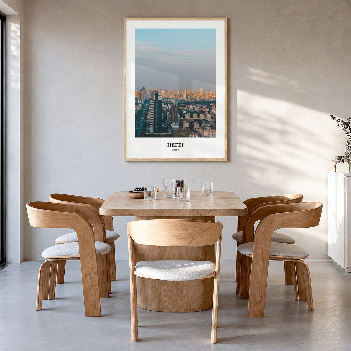 Hefei Classic Poster in a natural wood frame, hanging in a dining room