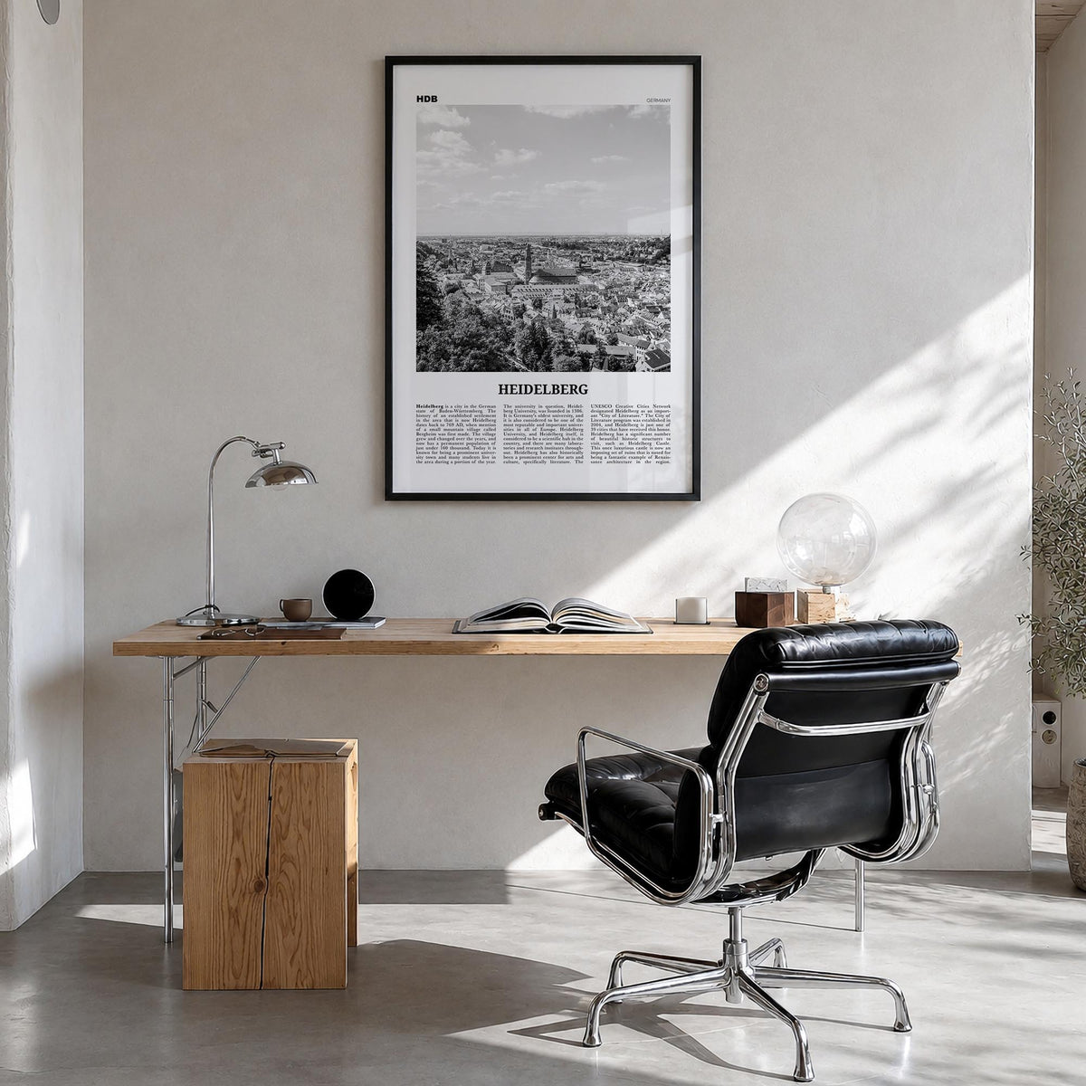 Heidelberg black & white newspaper poster of Germany – vertical wall art in black wood frame, hanging on wall