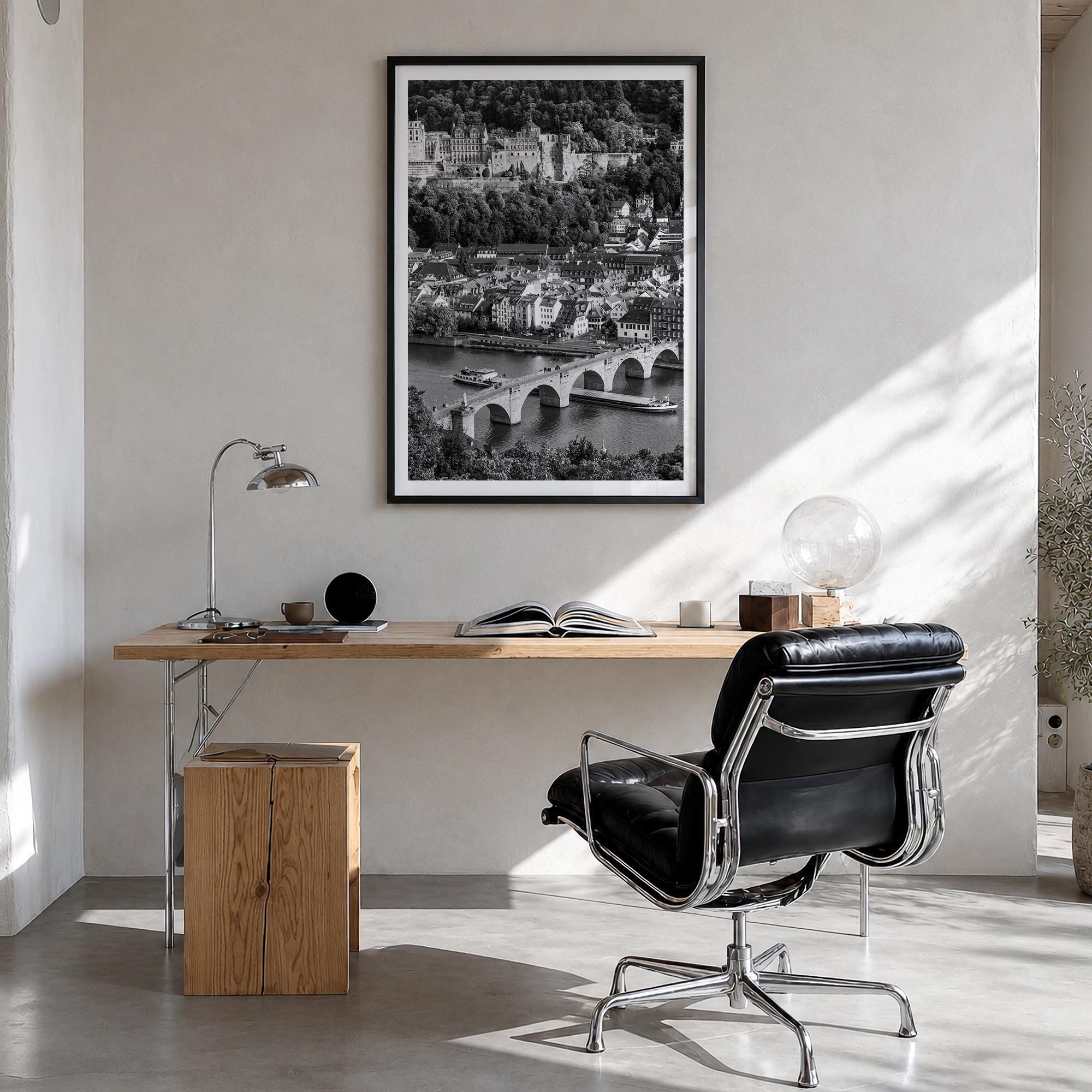 Heidelberg black & white photo poster of Germany – vertical wall art in black wood frame with white border, hanging on wall