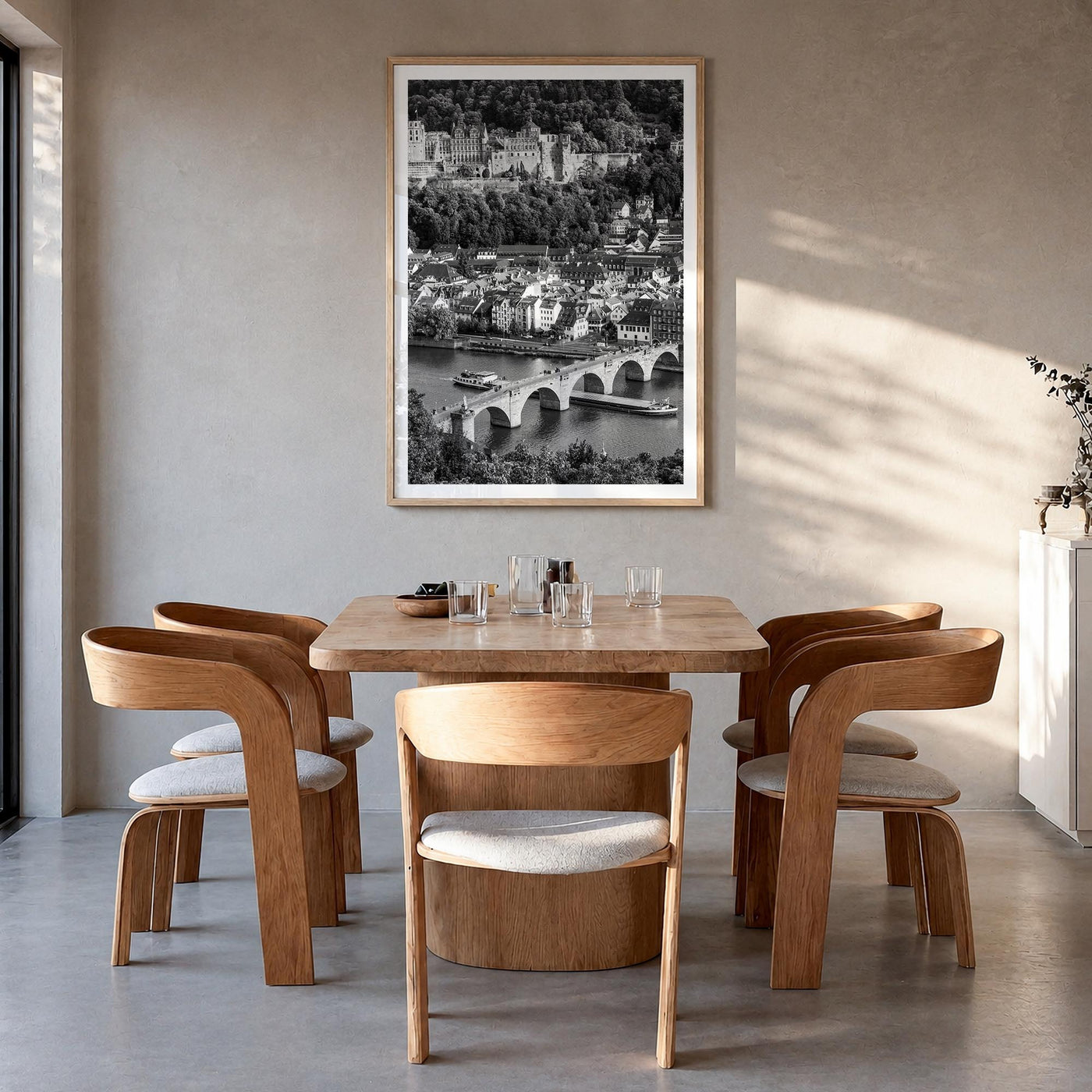 Heidelberg black & white photo poster of Germany – vertical wall art in natural wood frame with white border, hanging on wall