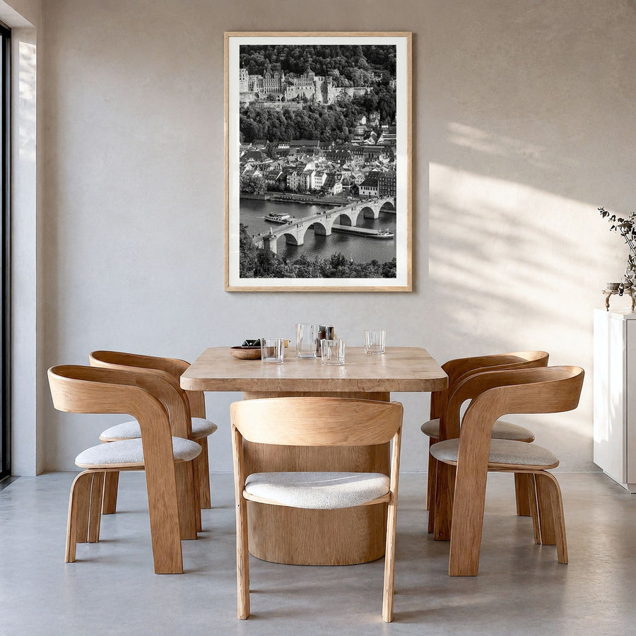 Heidelberg Photo Poster in a natural wood frame, hanging in a dining room, white border