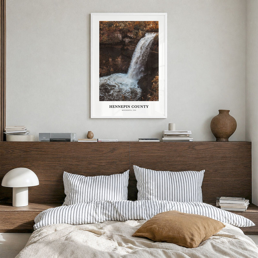 Hennepin County Classic Poster in a white wood frame, hanging in a bedroom