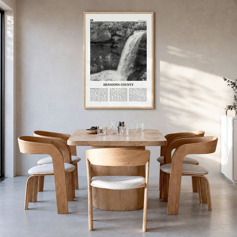 Hennepin County Newspaper Poster in a natural wood frame, hanging in a dining room