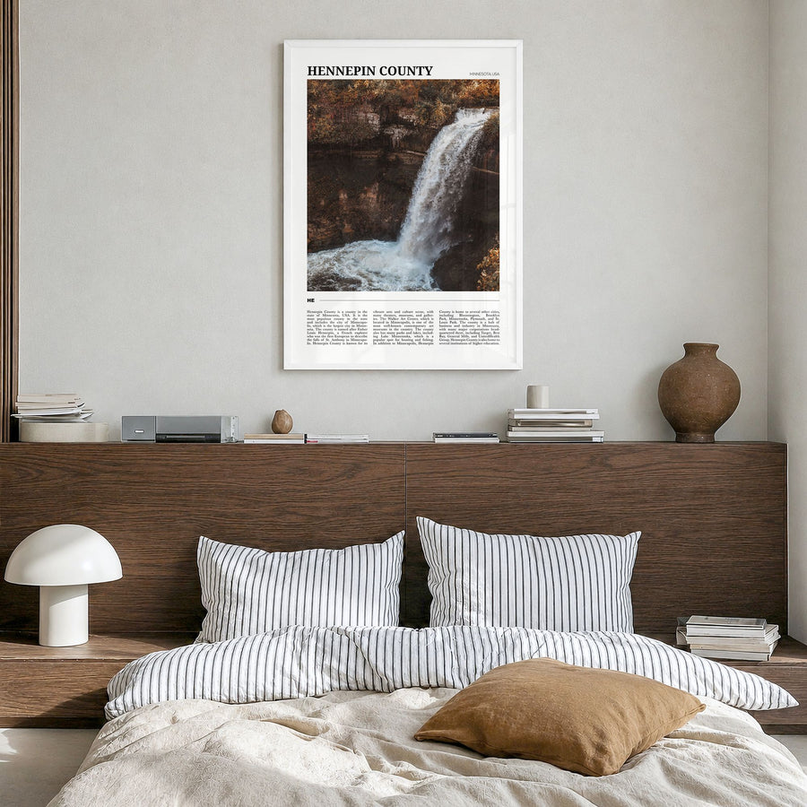 Hennepin County Travel Poster in a white wood frame, hanging in a bedroom