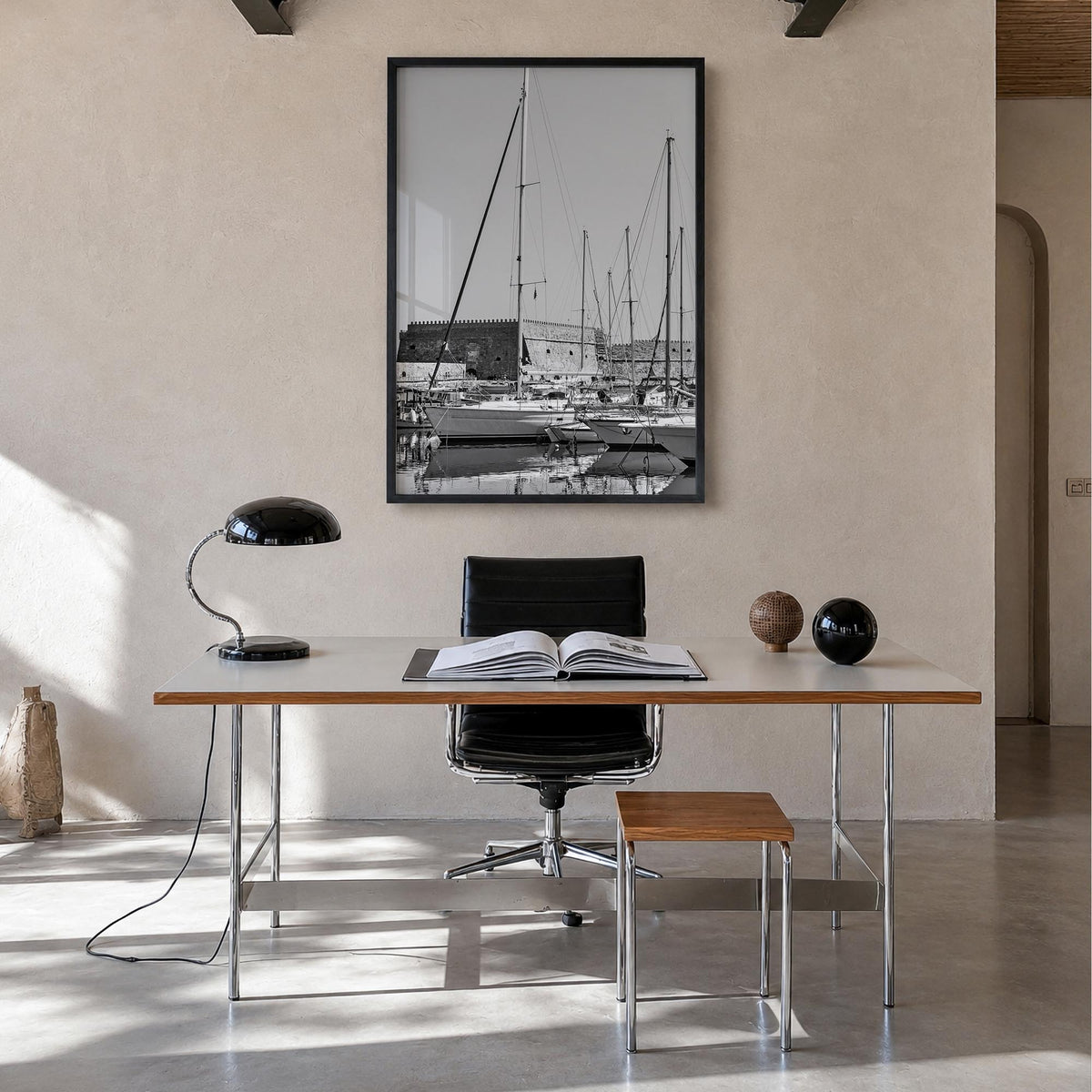 Heraklion black & white photo poster of Greece – vertical wall art in black wood frame, hanging on wall