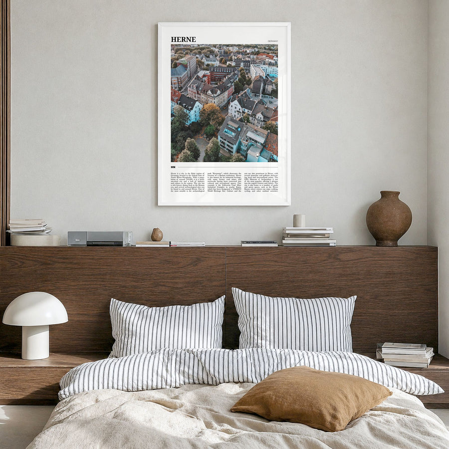 Herne Travel Poster in a white wood frame, hanging in a bedroom