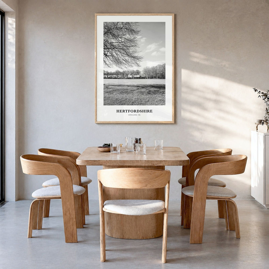 Hertfordshire Classic Poster in a natural wood frame, hanging in a dining room
