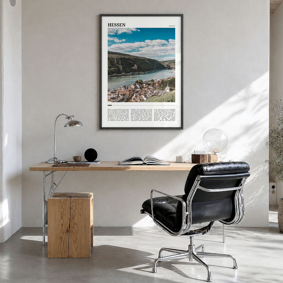 Hesse Travel Poster in a black wood frame, hanging in a bright home office