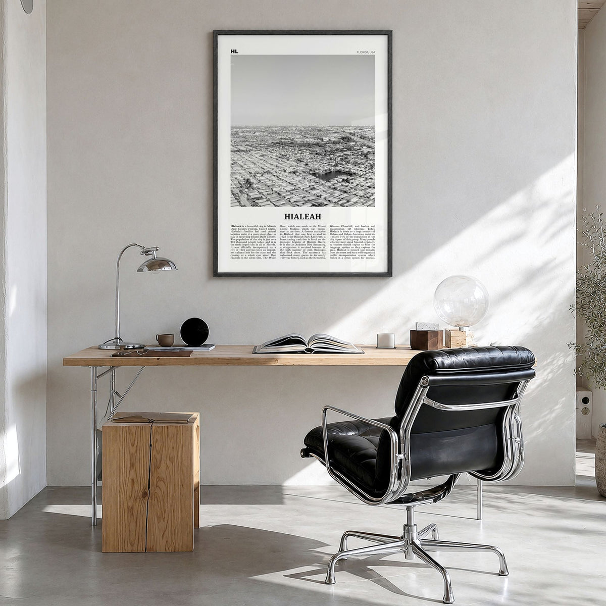 Hialeah Newspaper Poster in a black wood frame, hanging in a bright home office