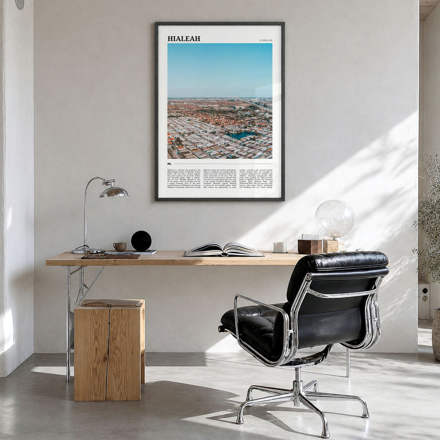 Hialeah Travel Poster in a black wood frame, hanging in a bright home office