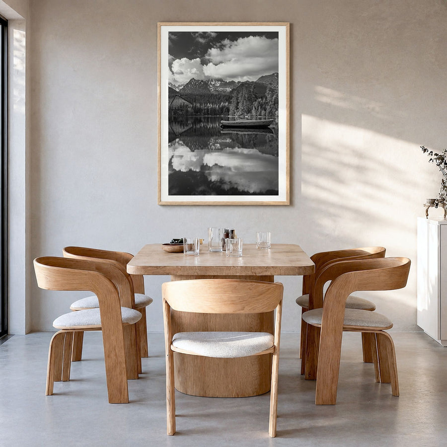 High Tatras Photo Poster in a natural wood frame, hanging in a dining room, white border