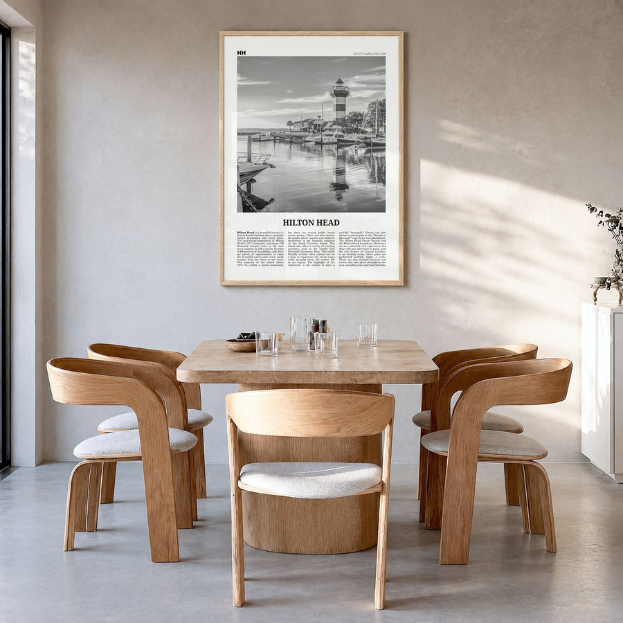 Hilton Head Island Newspaper Poster in a natural wood frame, hanging in a dining room