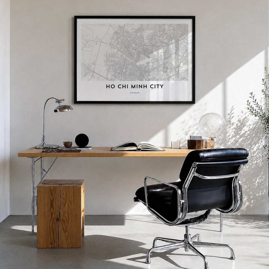 Ho Chi Minh City black & white map poster of Vietnam – horizontal wall art in black wood frame, hanging on wall