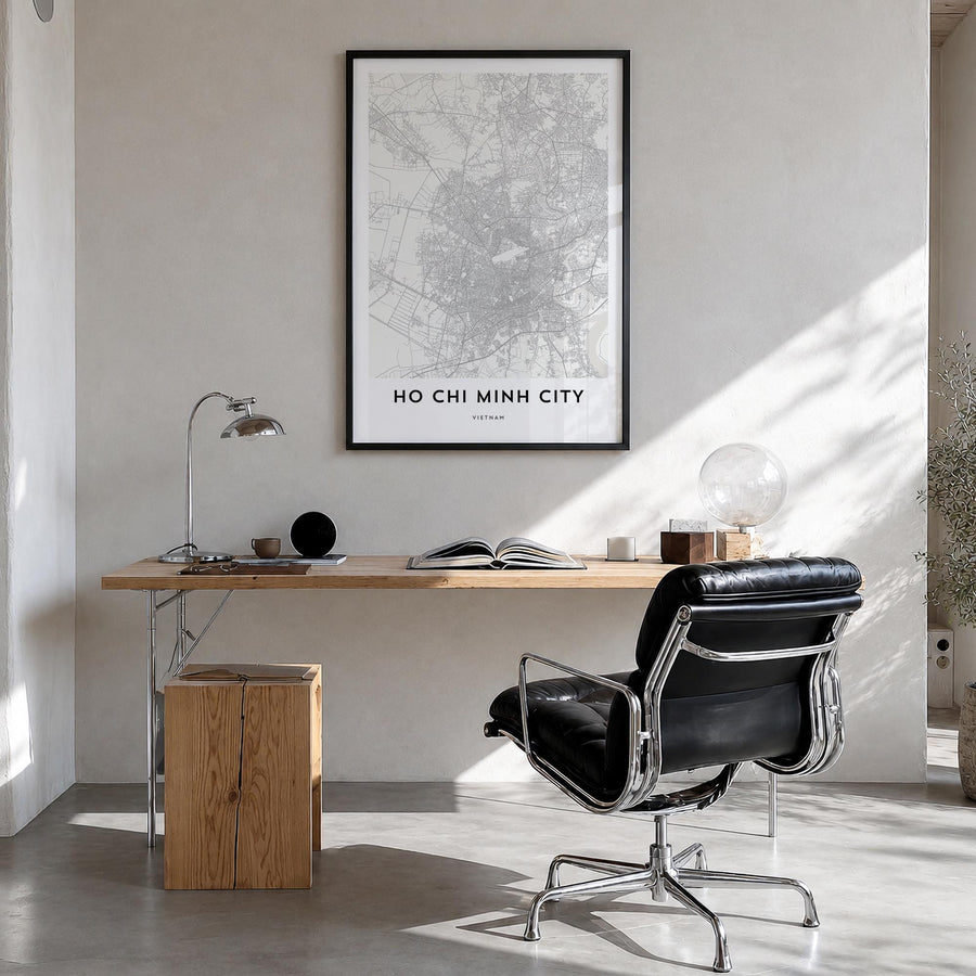 Ho Chi Minh City black & white map poster of Vietnam – vertical wall art in black wood frame, hanging on wall
