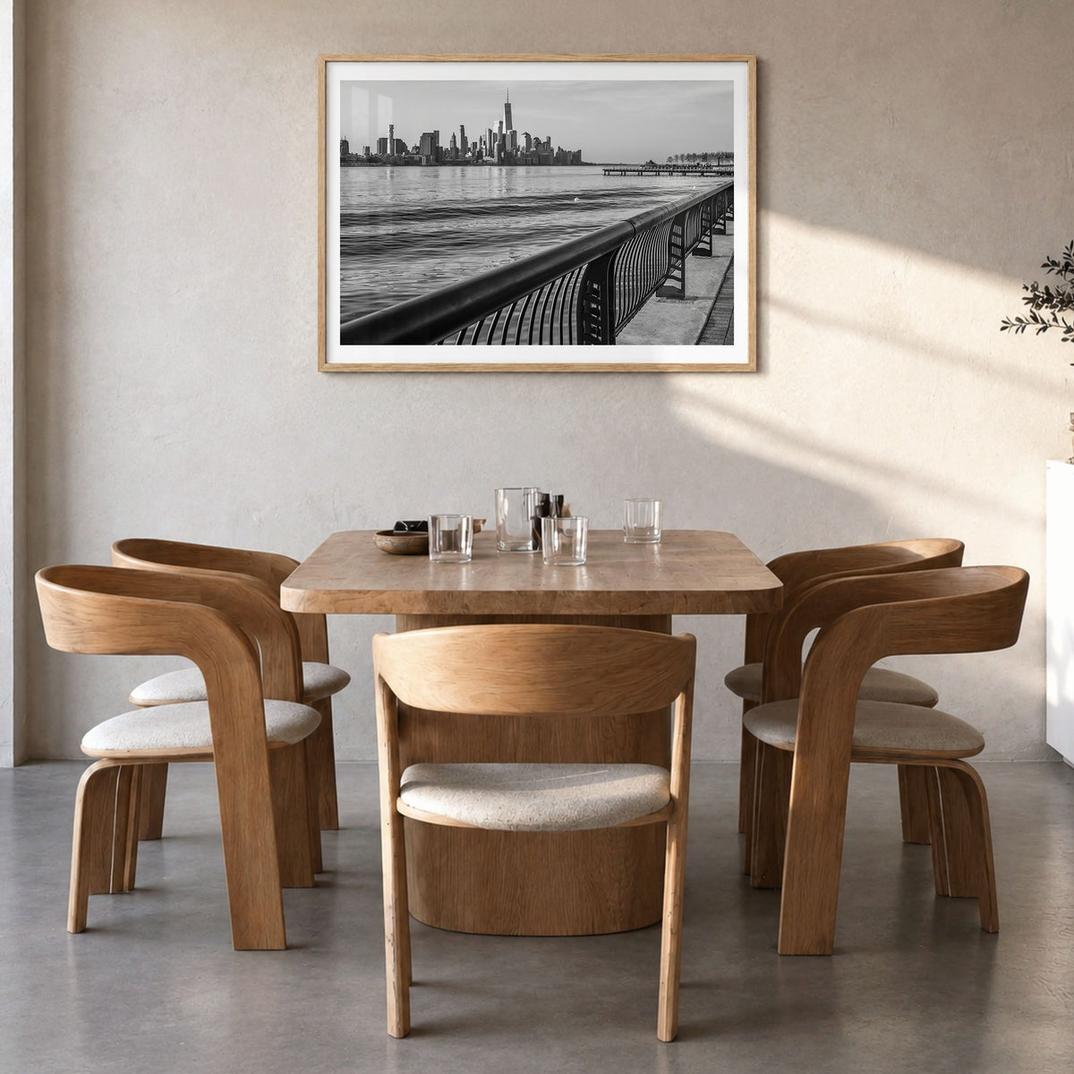 Hoboken Photo Poster in a natural wood frame, hanging in a dining room, white border