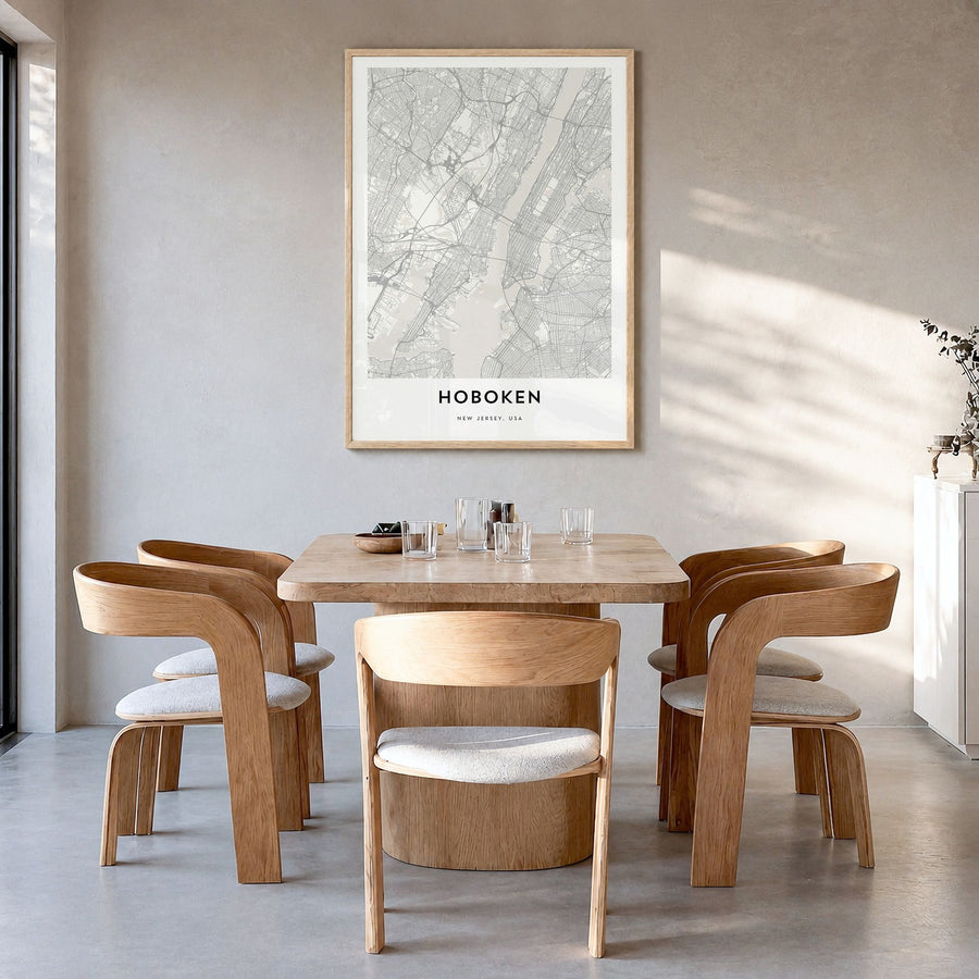 Hoboken Map Poster in a natural wood frame, hanging in a dining room