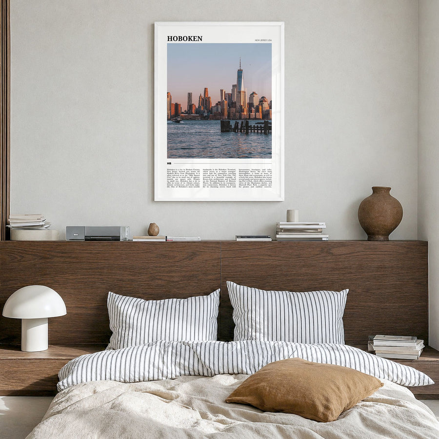 Hoboken Travel Poster in a white wood frame, hanging in a bedroom