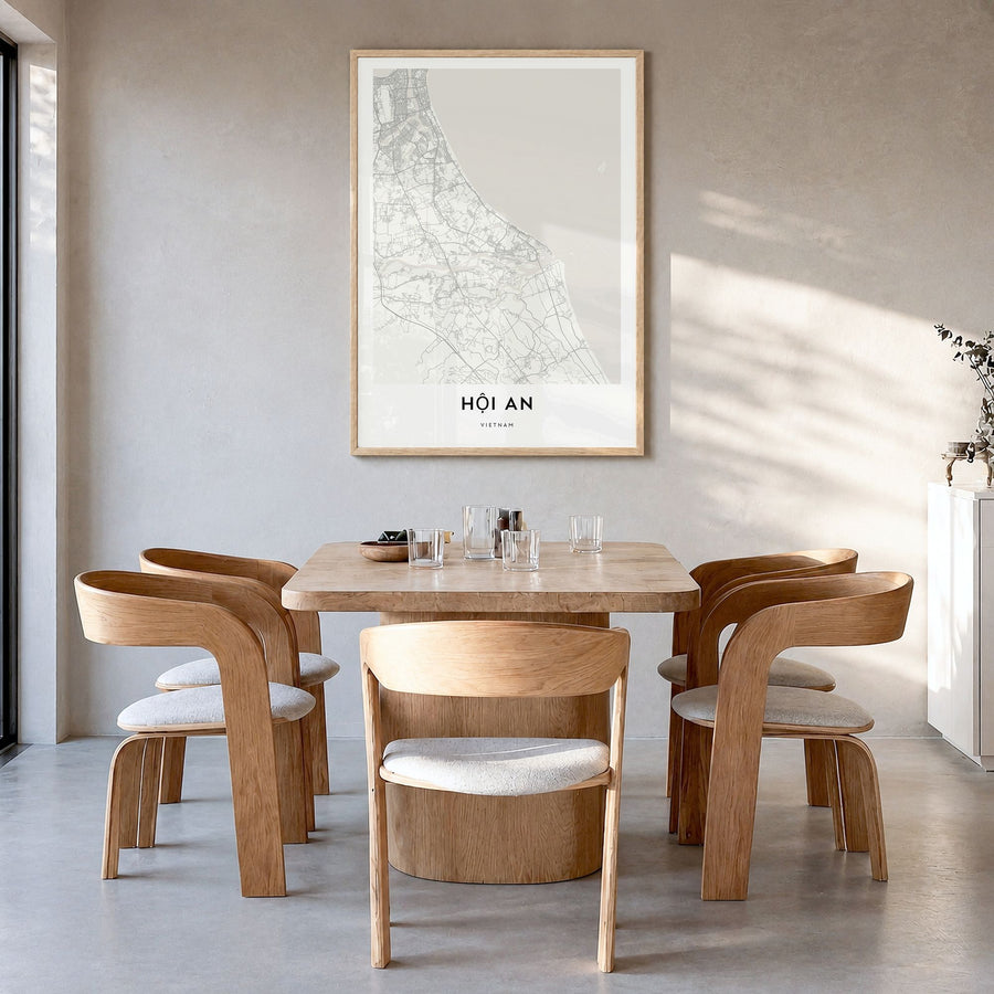 Hoi An Map Poster in a natural wood frame, hanging in a dining room