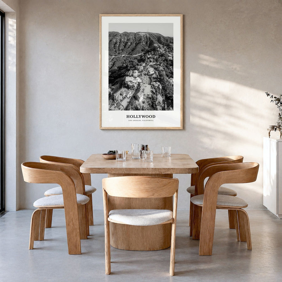 Hollywood Classic Poster in a natural wood frame, hanging in a dining room