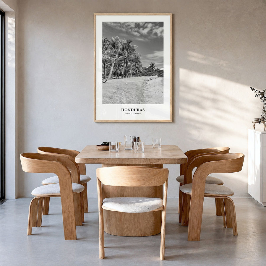 Honduras Classic Poster in a natural wood frame, hanging in a dining room