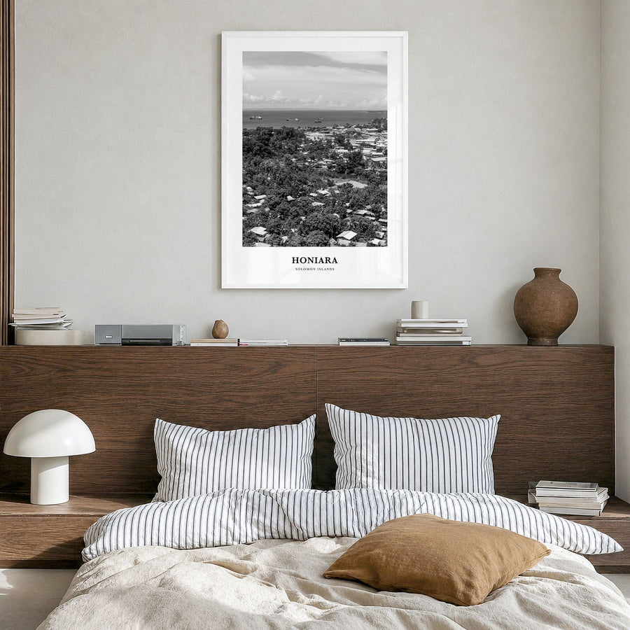Honiara Classic Poster in a white wood frame, hanging in a bedroom