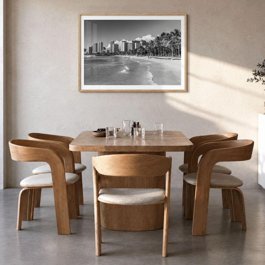Honolulu Photo Poster in a natural wood frame, hanging in a dining room, white border
