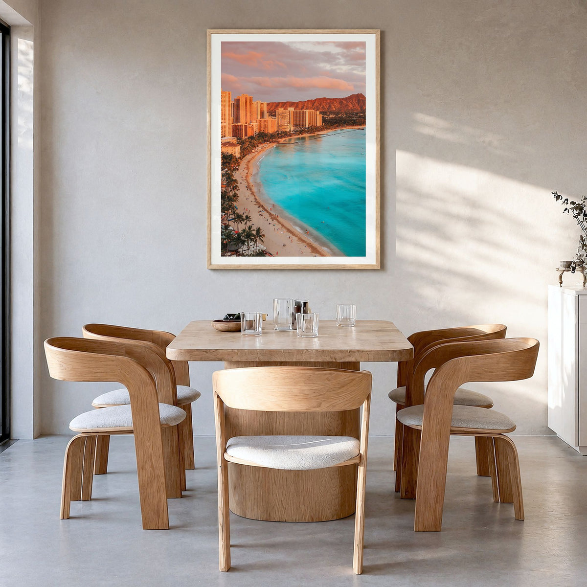 Honolulu Photo Poster in a natural wood frame, hanging in a dining room, white border