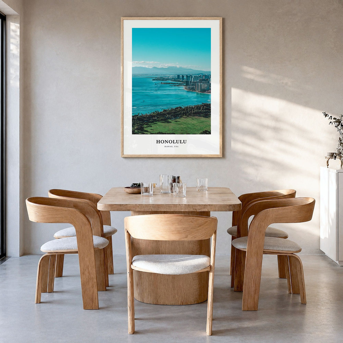 Honolulu Classic Poster in a natural wood frame, hanging in a dining room