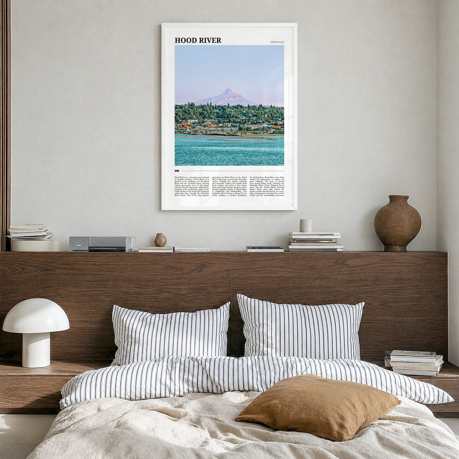 Hood River Travel Poster in a white wood frame, hanging in a bedroom