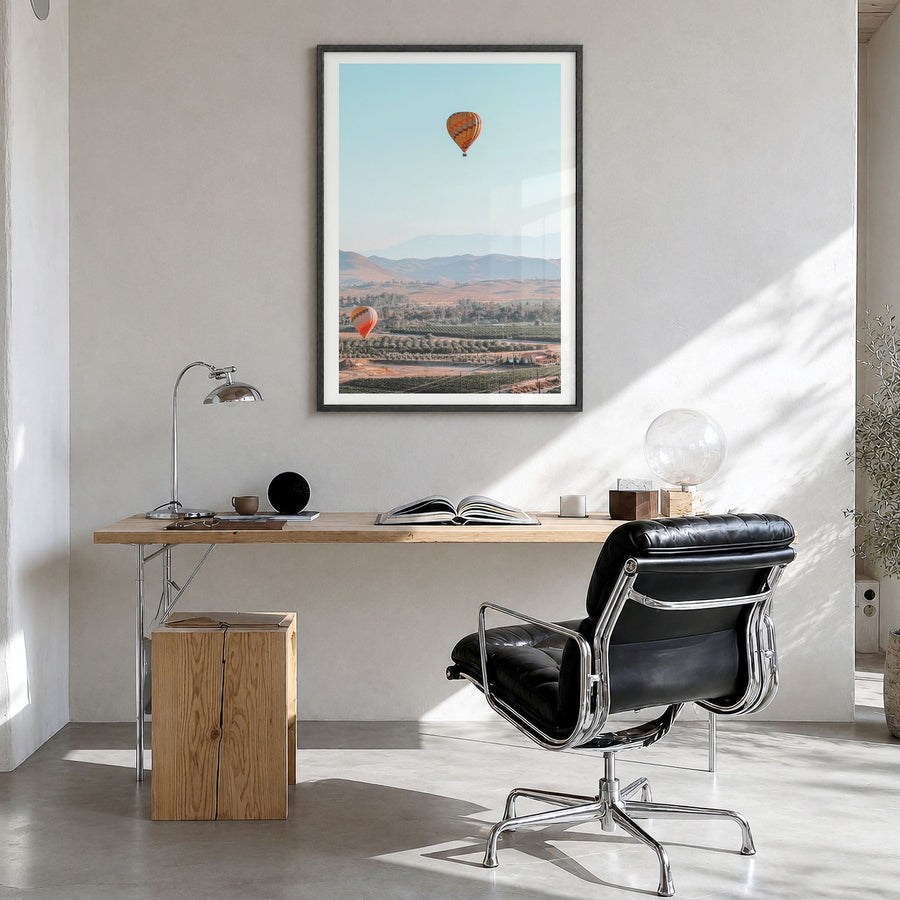 Hot Air Balloon Photo No 2 Poster in a black wood frame, hanging in a bright home office, white border