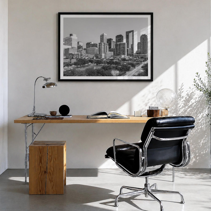 Houston black & white photo poster of Texas, USA – horizontal wall art in black wood frame with white border, hanging on wall