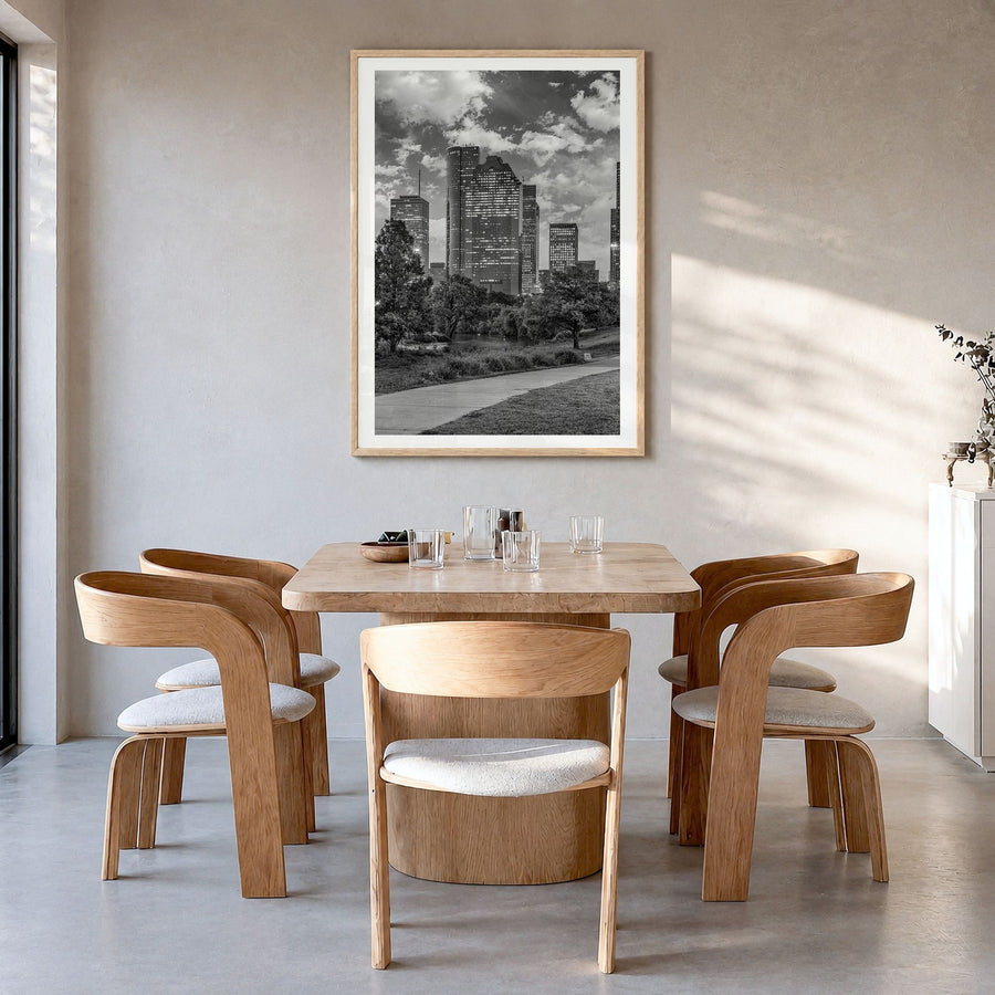 Houston Photo No 2 Poster in a natural wood frame, hanging in a dining room, white border