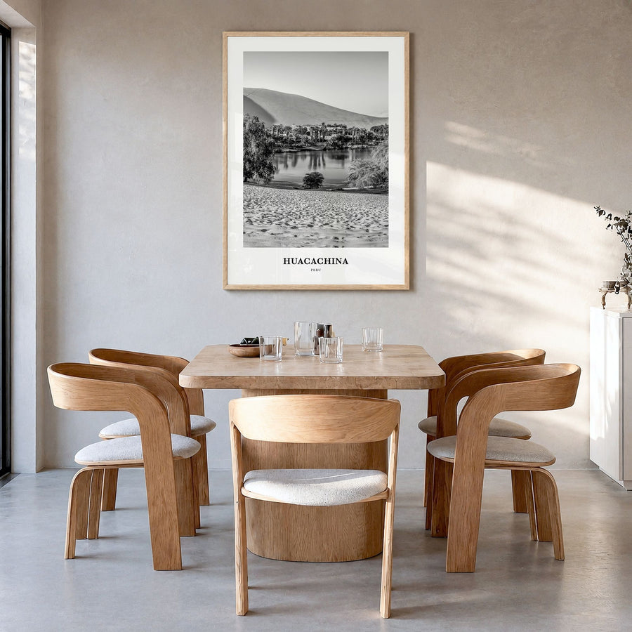 Huacachina Classic Poster in a natural wood frame, hanging in a dining room