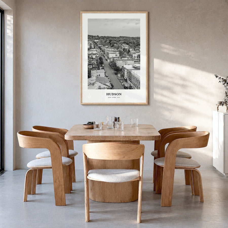 Hudson Classic Poster in a natural wood frame, hanging in a dining room