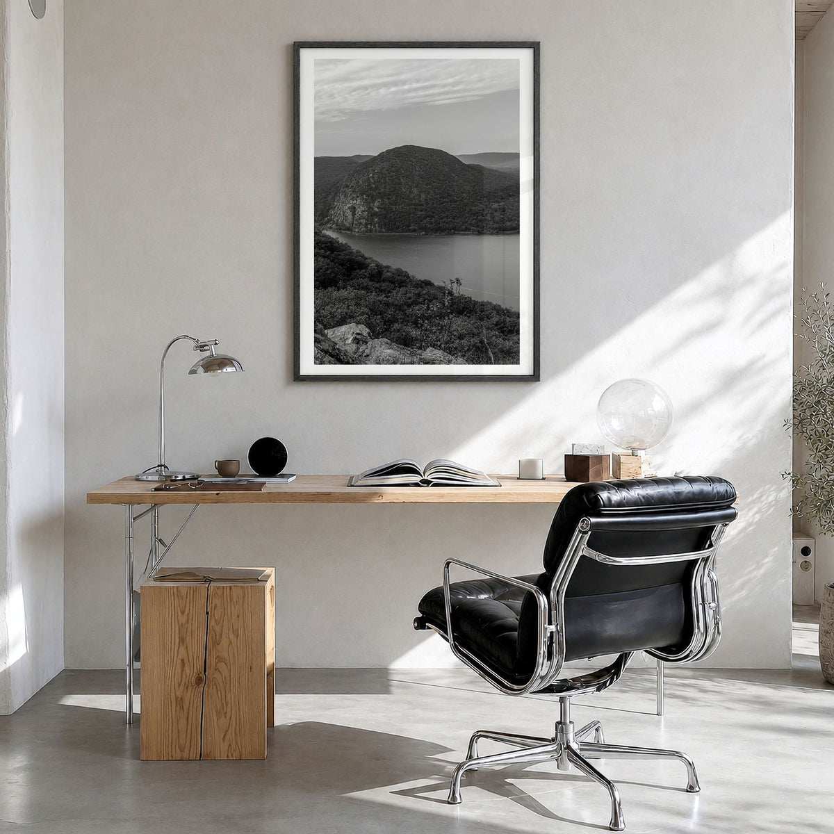 Hudson Valley Photo Poster in a black wood frame, hanging in a bright home office, white border