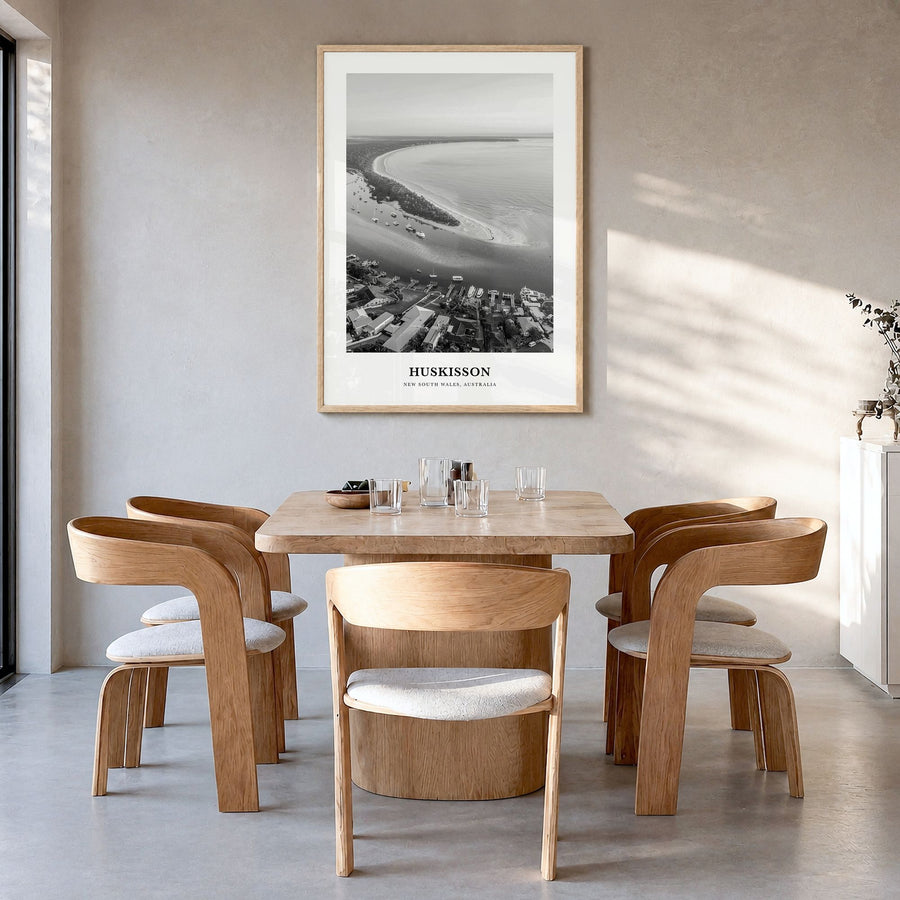 Huskisson Classic Poster in a natural wood frame, hanging in a dining room