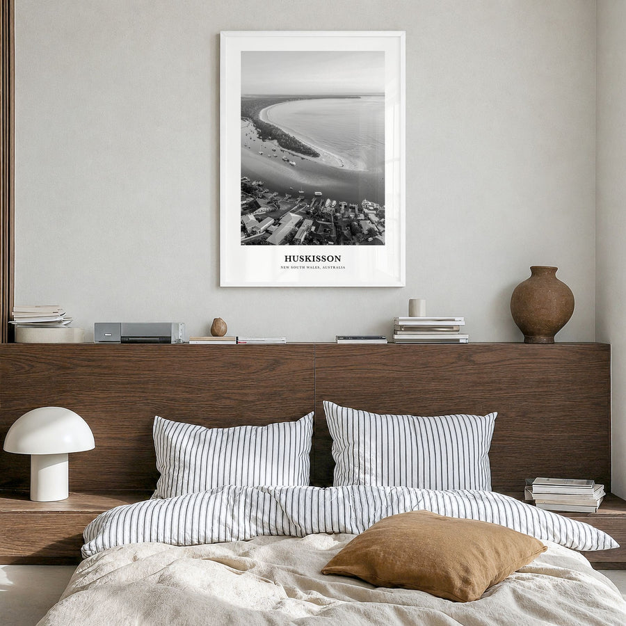 Huskisson Classic Poster in a white wood frame, hanging in a bedroom
