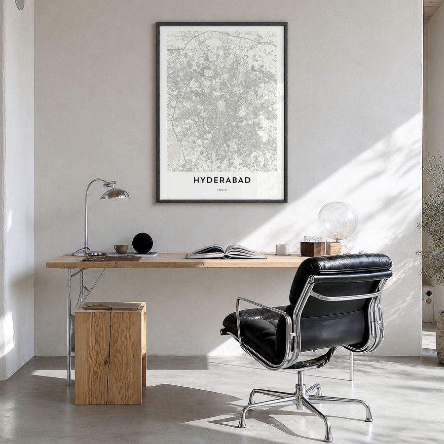 Hyderabad Map Poster in a black wood frame, hanging in a bright home office