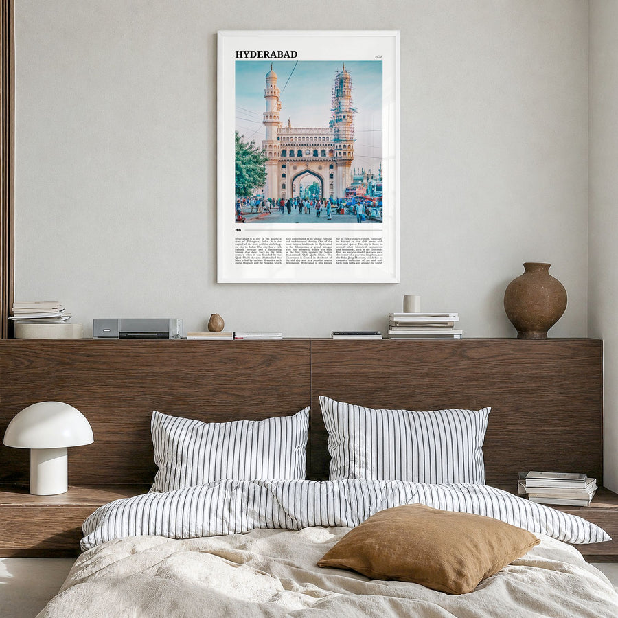 Hyderabad Travel Poster in a white wood frame, hanging in a bedroom