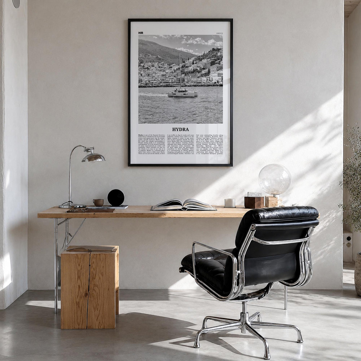 Hydra black & white newspaper poster of Greece – vertical wall art in black wood frame, hanging on wall