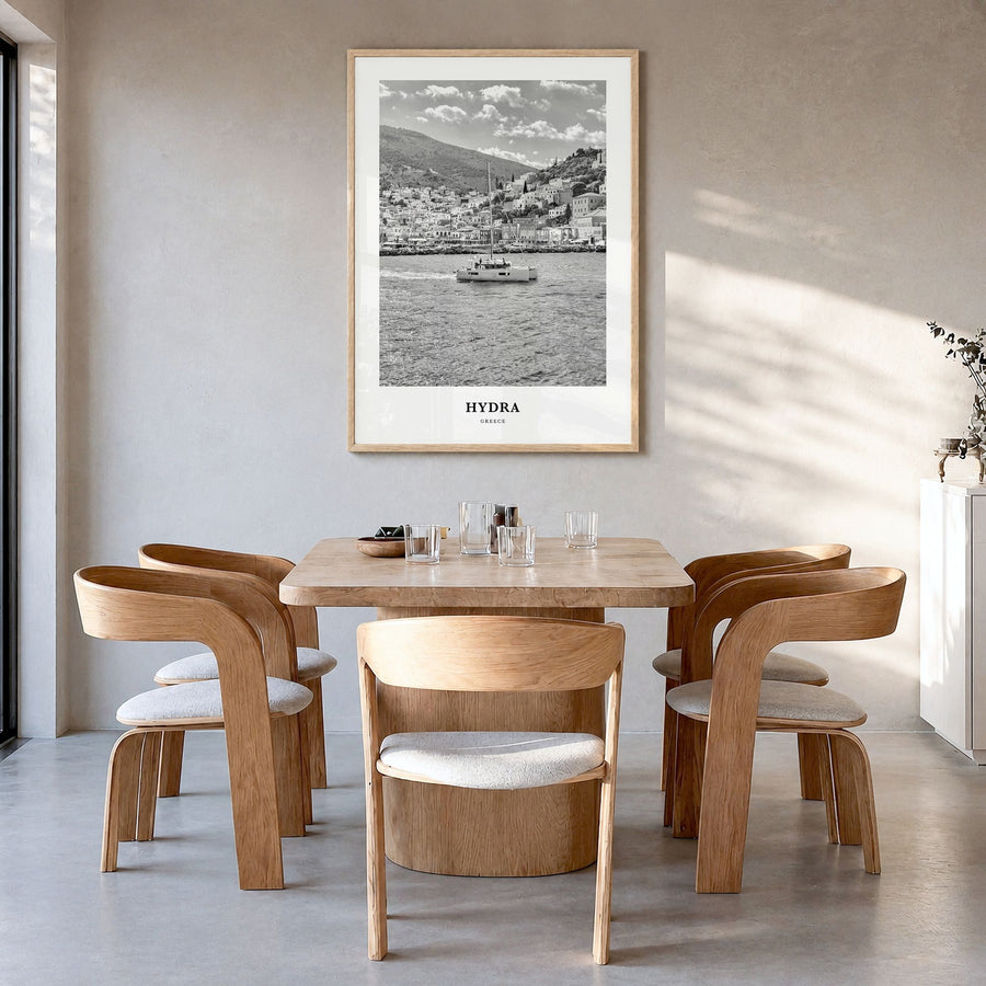 Hydra Classic Poster in a natural wood frame, hanging in a dining room