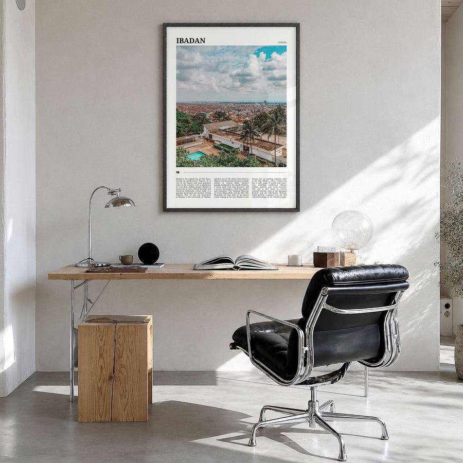 Ibadan Travel Poster in a black wood frame, hanging in a bright home office